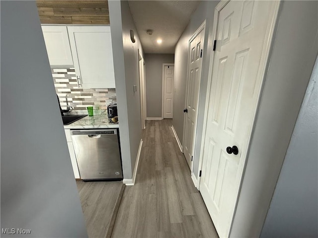 hall featuring light hardwood / wood-style floors