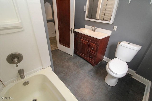 full bathroom featuring bathtub / shower combination, vanity, and toilet