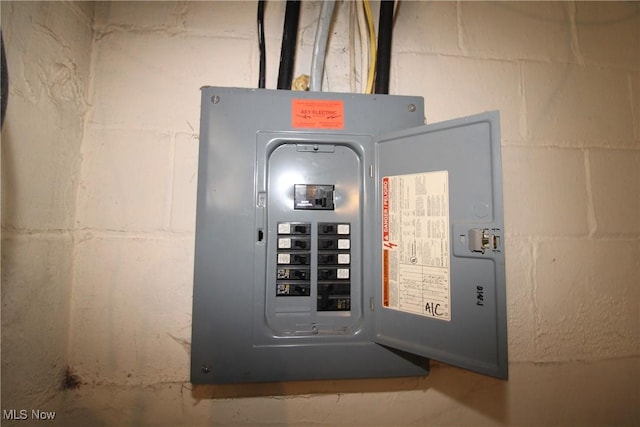 utility room featuring electric panel