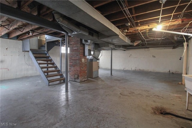 basement featuring heating unit