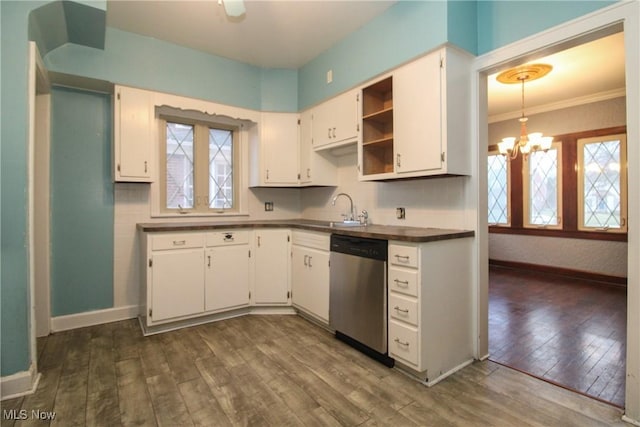 kitchen featuring dishwasher, white cabinetry, an inviting chandelier, dark hardwood / wood-style floors, and ornamental molding