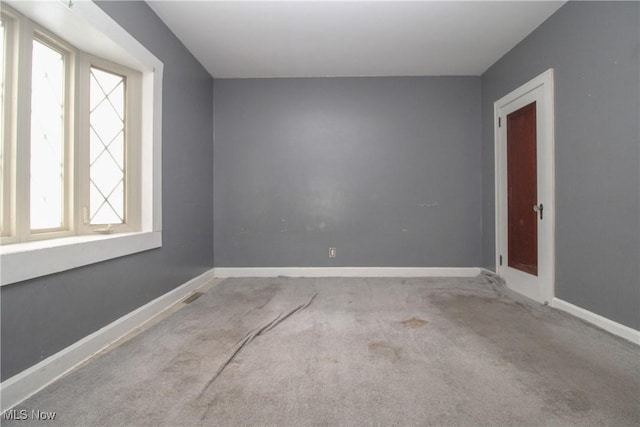 view of carpeted spare room