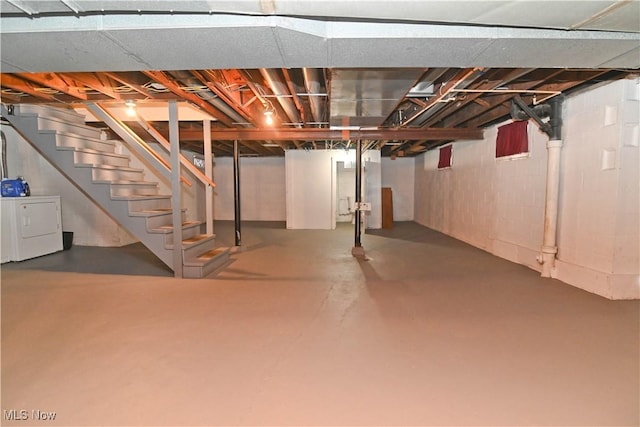 basement with separate washer and dryer