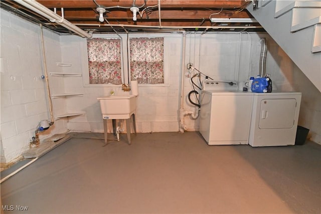 basement with washing machine and dryer