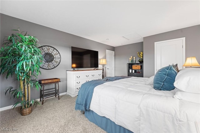 bedroom featuring light carpet