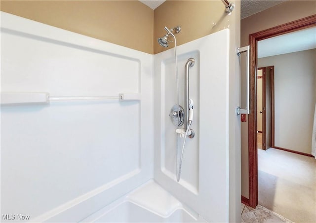 bathroom featuring walk in shower