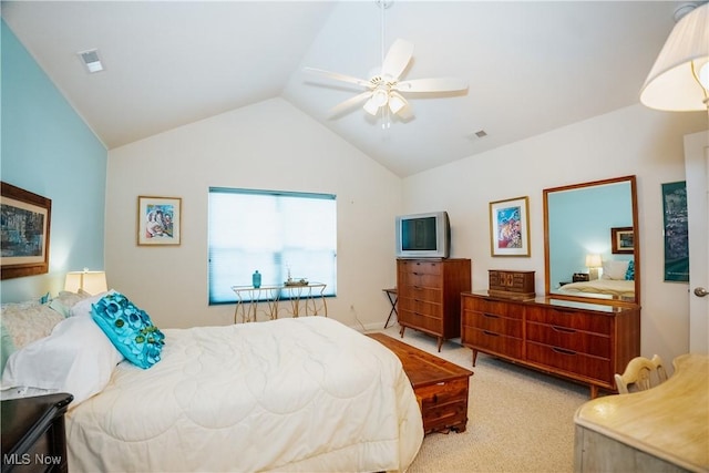 carpeted bedroom with lofted ceiling and ceiling fan