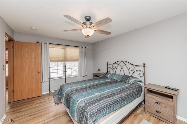 bedroom featuring ceiling fan and light wood-type flooring