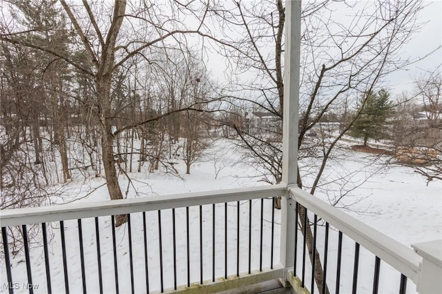 view of snow covered deck