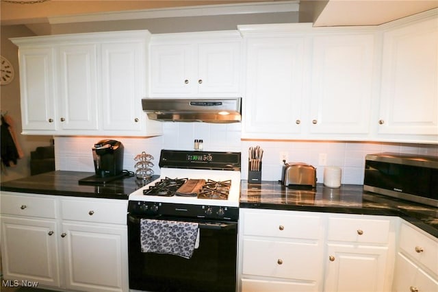 kitchen with white cabinets and gas range oven