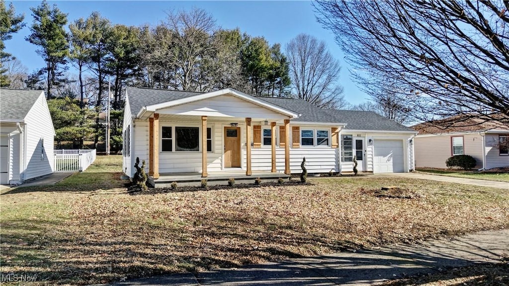 view of front of house featuring a garage and covered porch