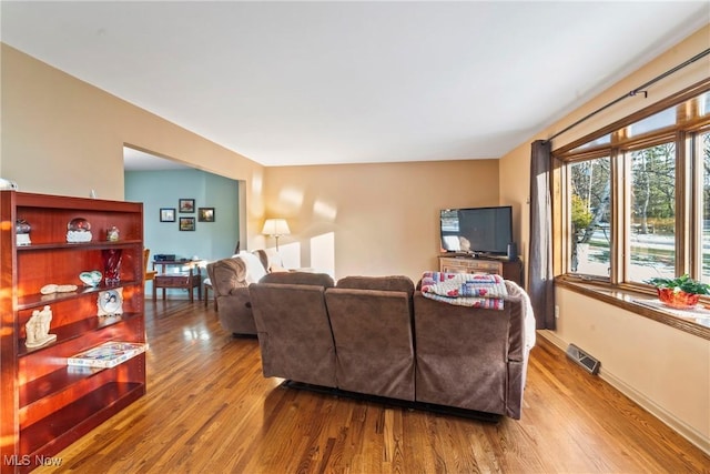 living room with hardwood / wood-style floors