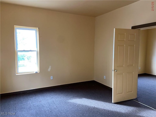 view of carpeted spare room