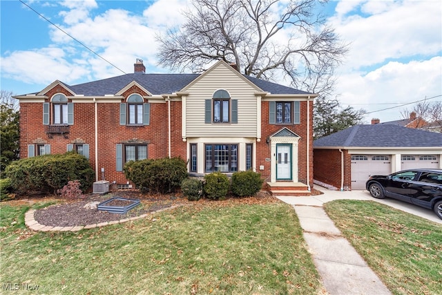 view of front of home featuring a garage, central AC unit, and a front lawn