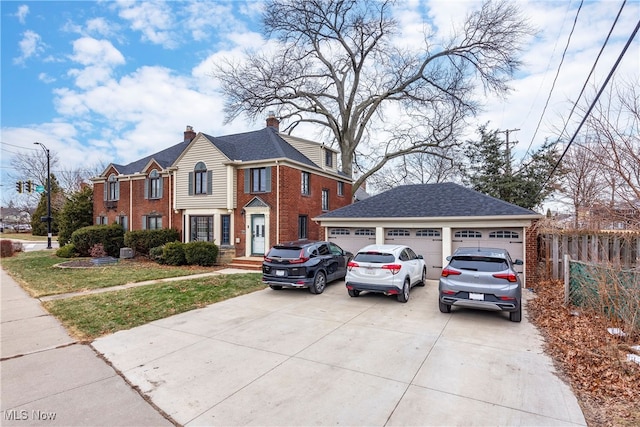 view of front facade featuring a garage and a front lawn