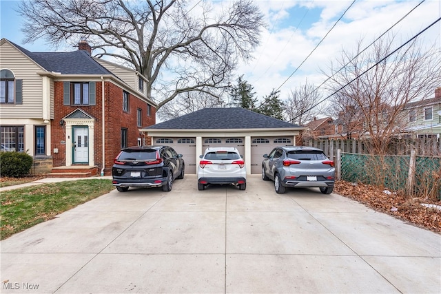 view of side of home featuring a garage