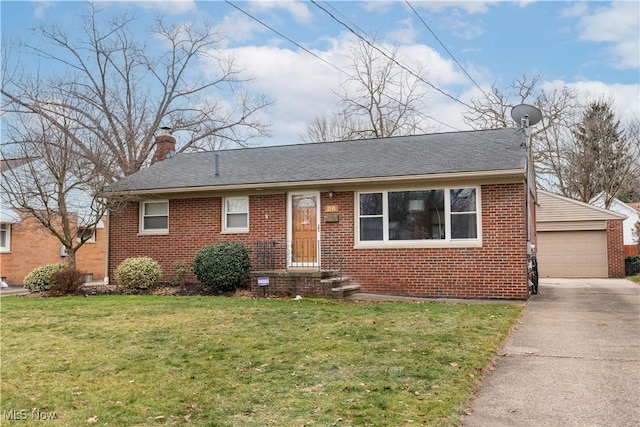 view of front of home featuring a garage and a front lawn