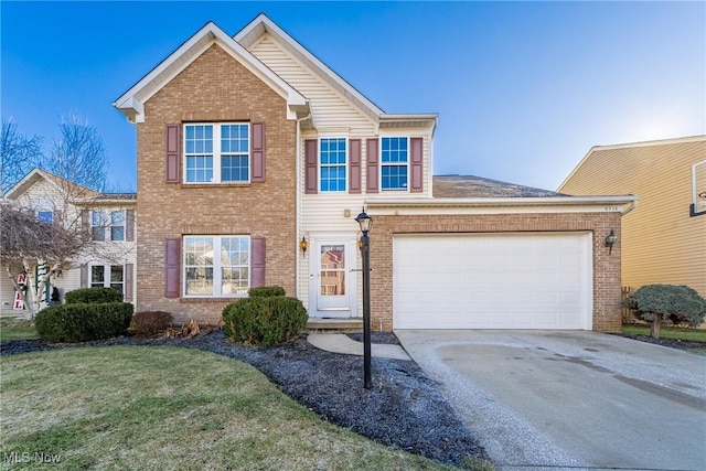 view of front of property featuring a garage and a front lawn