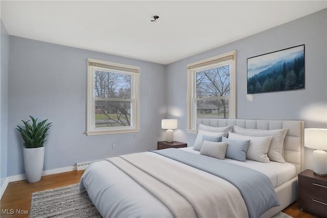 bedroom featuring hardwood / wood-style flooring