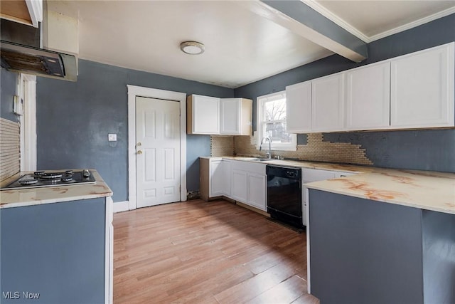 kitchen with sink, light wood-type flooring, black dishwasher, stainless steel gas stovetop, and white cabinets