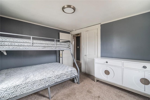 bedroom featuring light carpet and ornamental molding