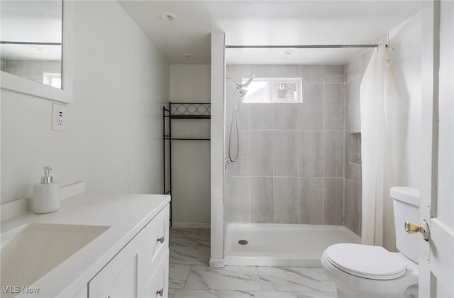 bathroom with vanity, toilet, and a shower with shower curtain