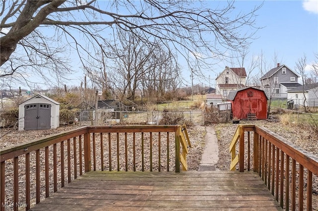 wooden deck with a storage unit