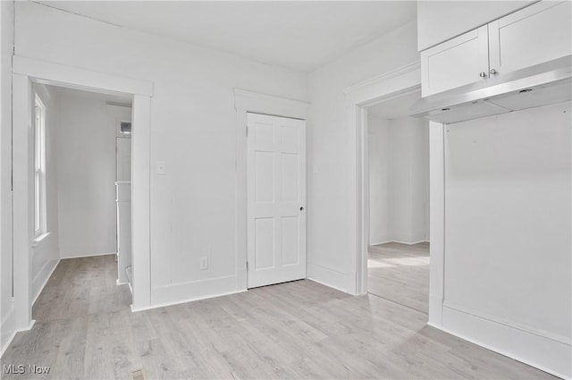 unfurnished bedroom featuring light hardwood / wood-style floors