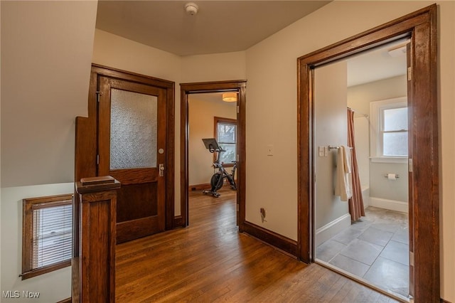 hallway featuring dark hardwood / wood-style floors