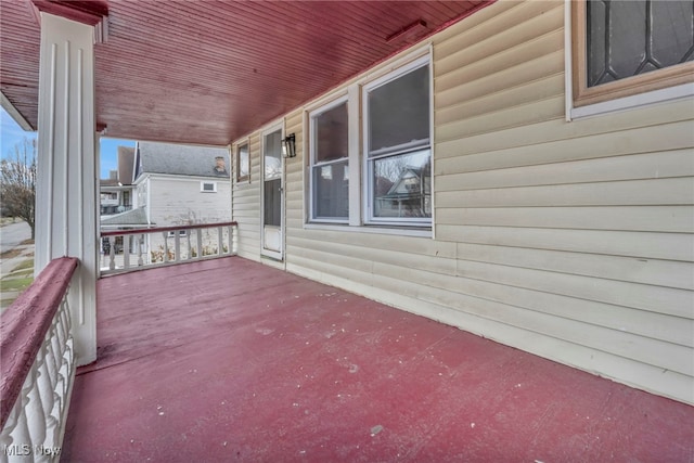 wooden terrace featuring a porch