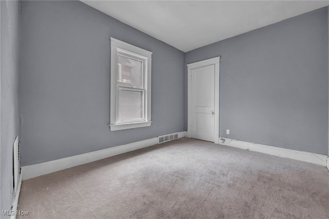 view of carpeted spare room