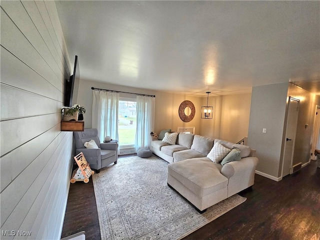 living room with dark hardwood / wood-style flooring