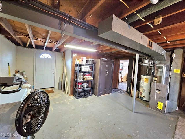 basement with heating unit and water heater