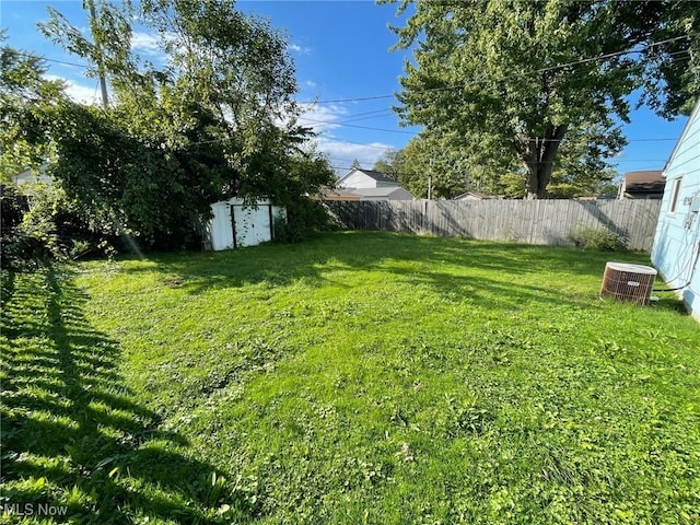 view of yard featuring central AC