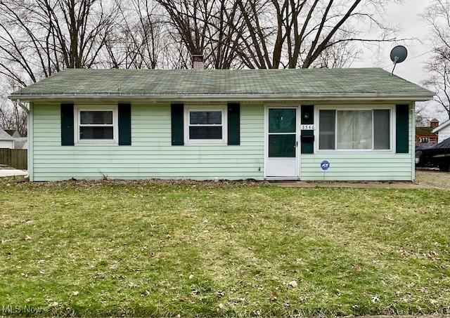 view of front of property with a front lawn