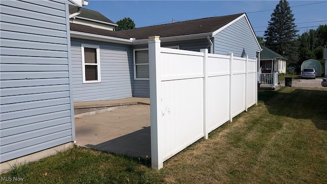 view of outdoor structure with a lawn