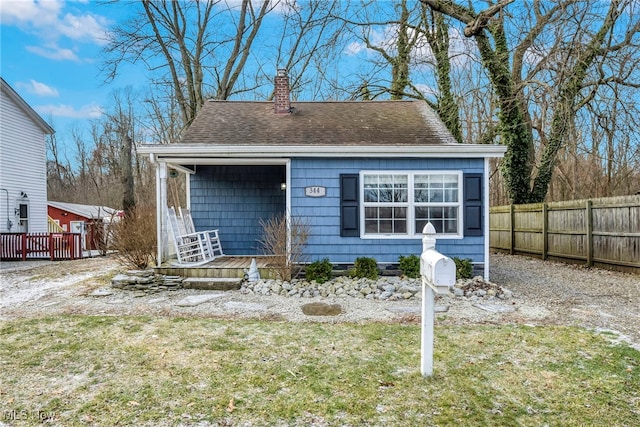 exterior space featuring a front lawn