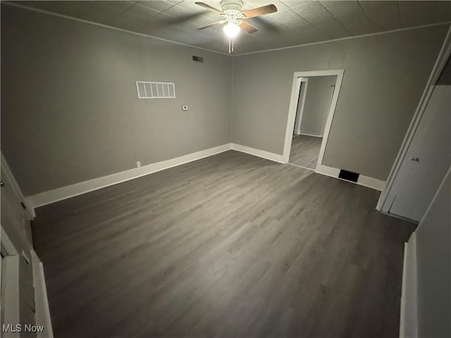 interior space featuring dark hardwood / wood-style flooring and ceiling fan