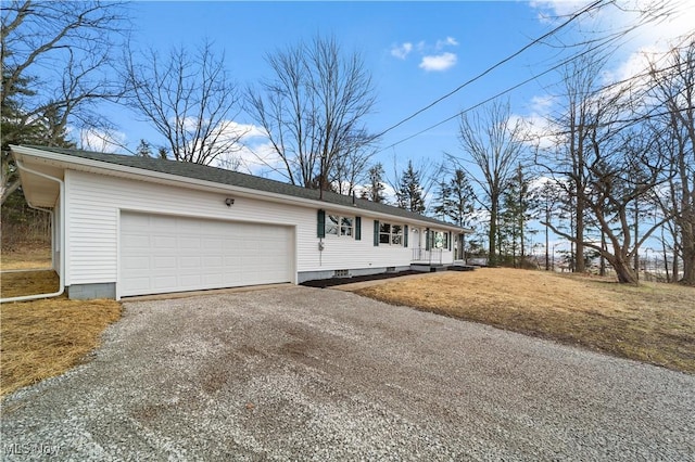 single story home featuring a garage