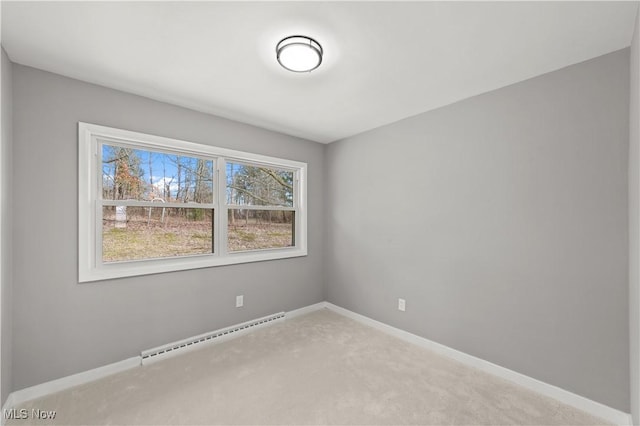 empty room featuring baseboard heating