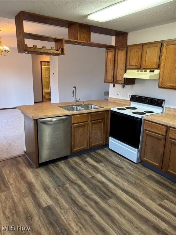 kitchen with sink, a textured ceiling, range with electric stovetop, dishwasher, and kitchen peninsula