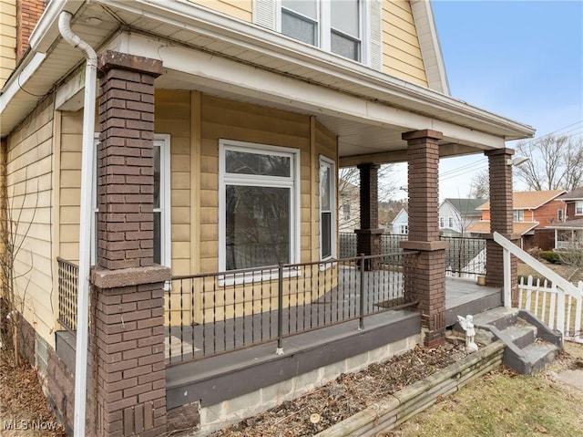 view of home's exterior with a porch