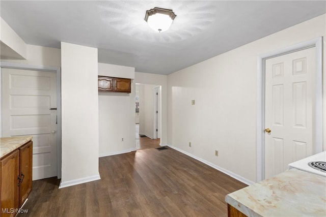 interior space featuring dark hardwood / wood-style flooring