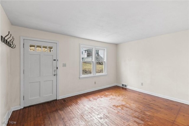 entrance foyer featuring hardwood / wood-style flooring