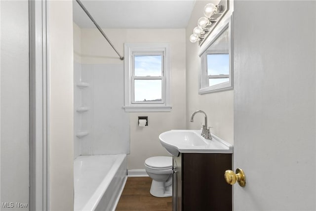 full bathroom with vanity, wood-type flooring,  shower combination, and toilet