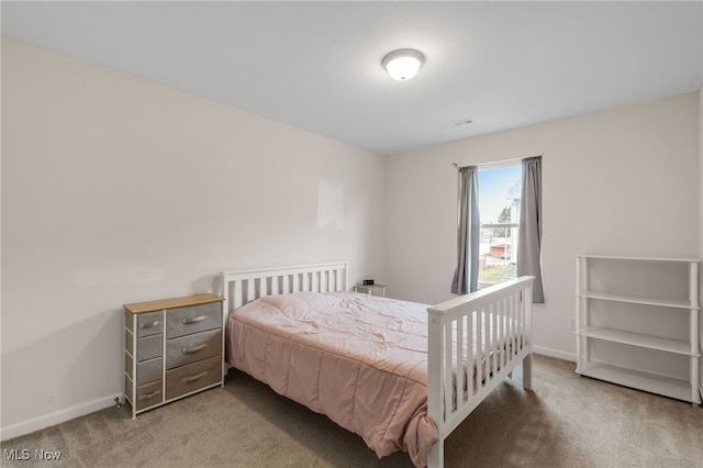 bedroom featuring carpet floors