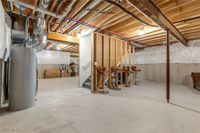 basement featuring electric water heater