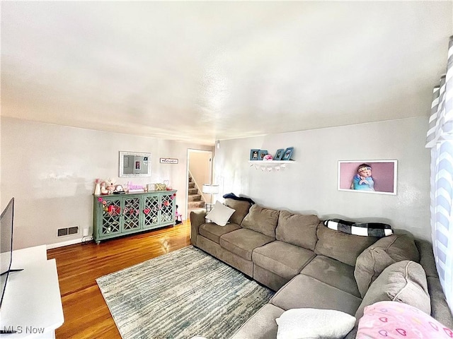 living room with hardwood / wood-style floors