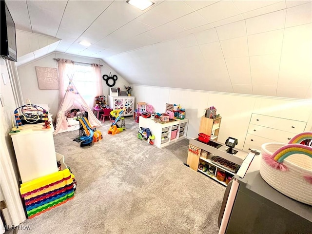 game room featuring carpet flooring and vaulted ceiling