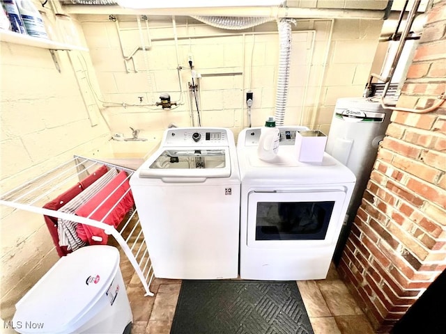 laundry area with washing machine and dryer